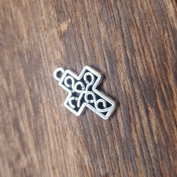 P115 cross charm openwork